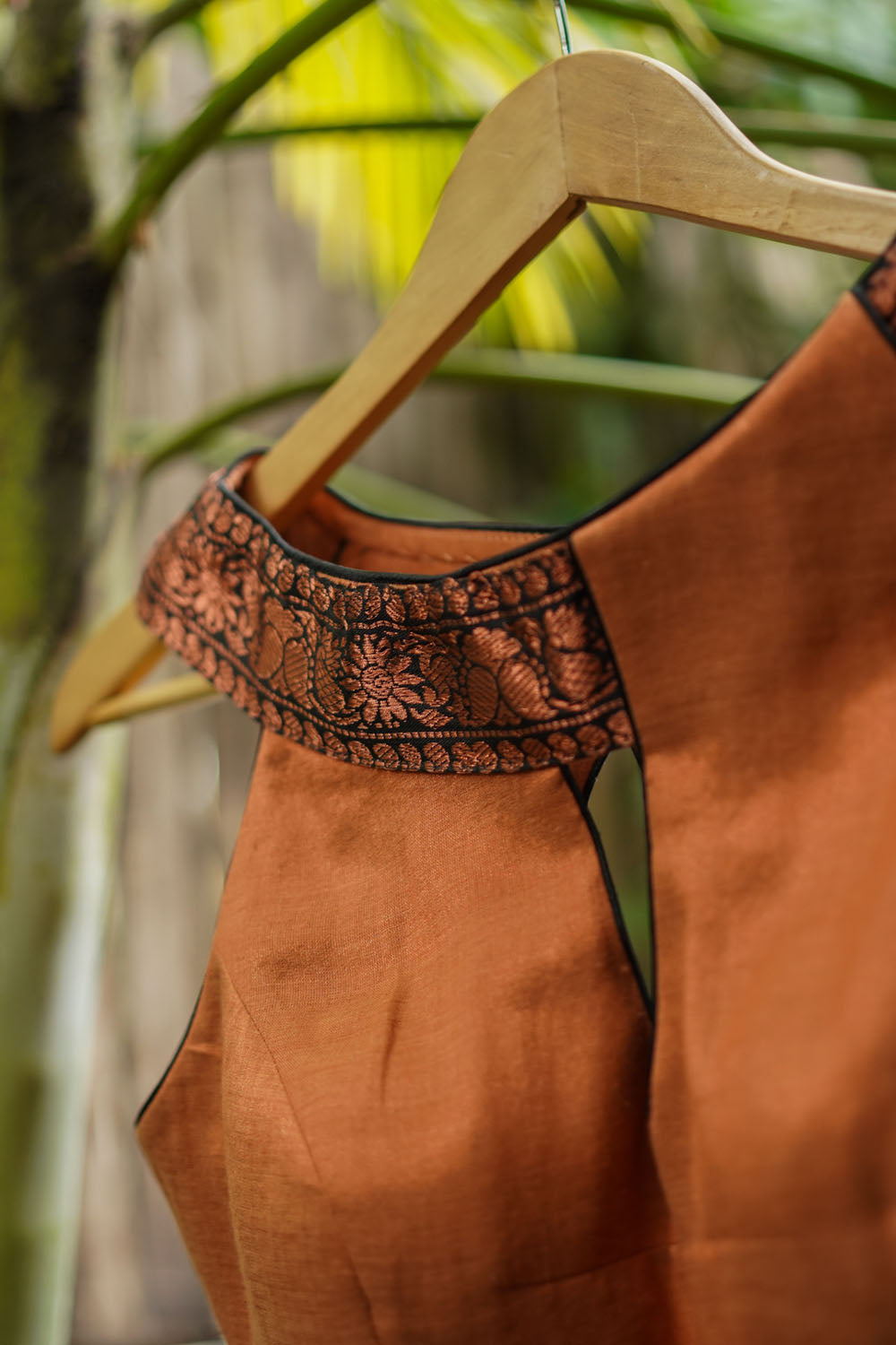 Copper shimmer boatneck blouse with border detailing