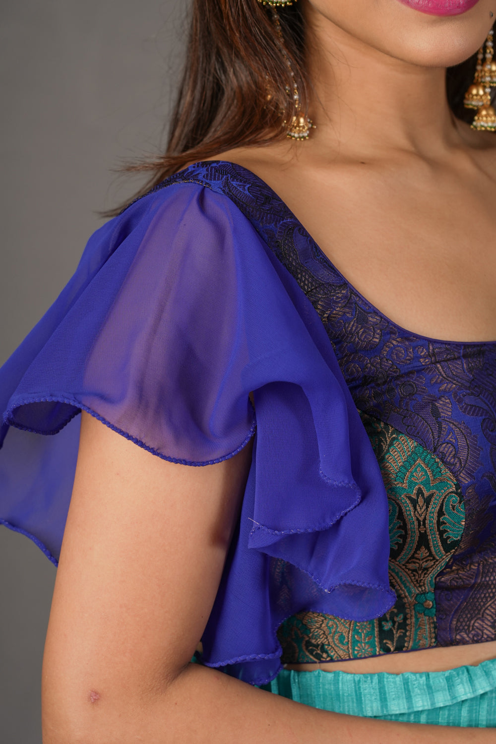 Turquoise blue banarasi brocade flutter sleeve U neck blouse