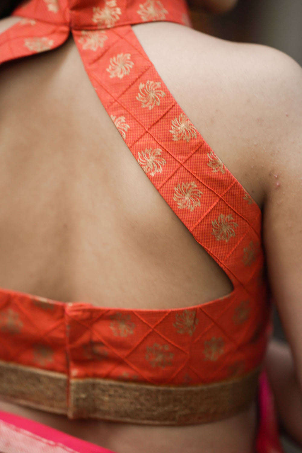 Orange handloom cotton gold block printed pintuck halter neck blouse