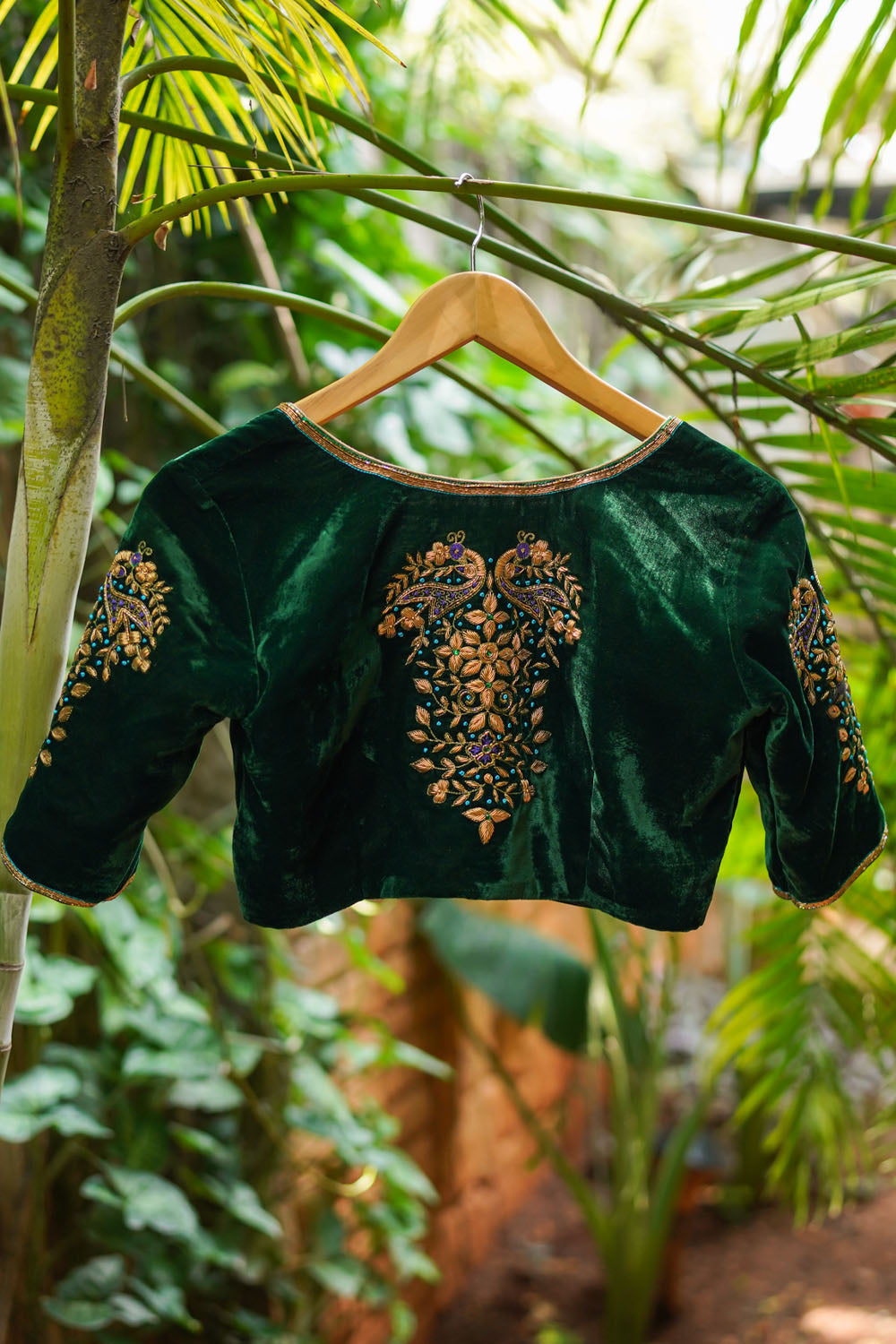 Green velvet sweetheart neck blouse with zardosi work