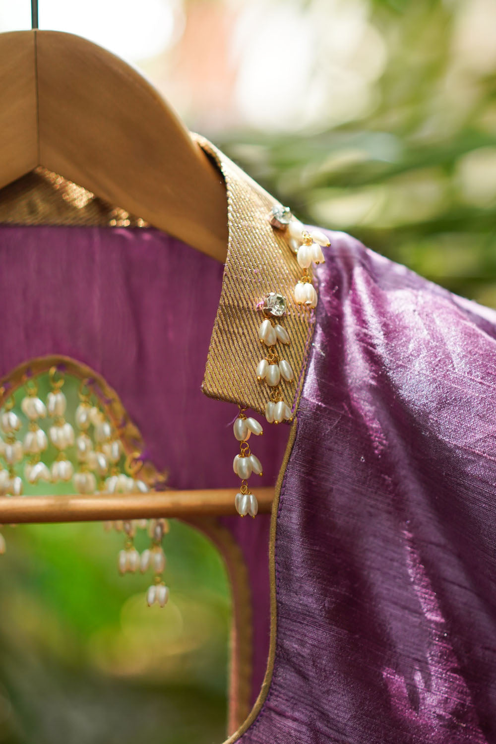 Dusty mauve raw silk chinese collar sweetheart neck blouse with beads detailing.