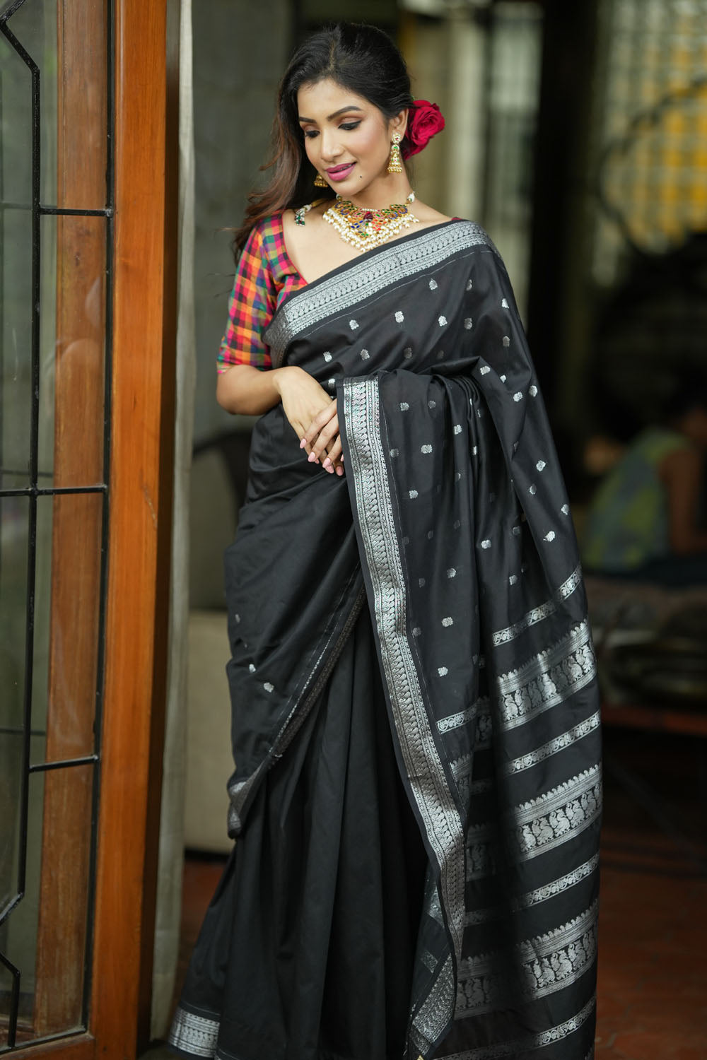 Black cotton silk with silver zari borders and buttas saree
