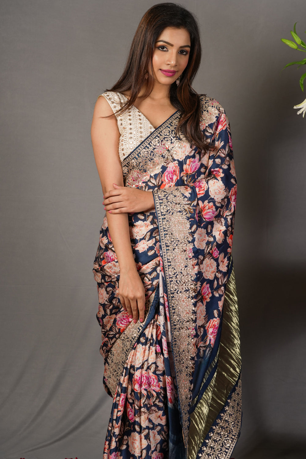 Navy blue gajji silk saree with floral print and crushed zari border