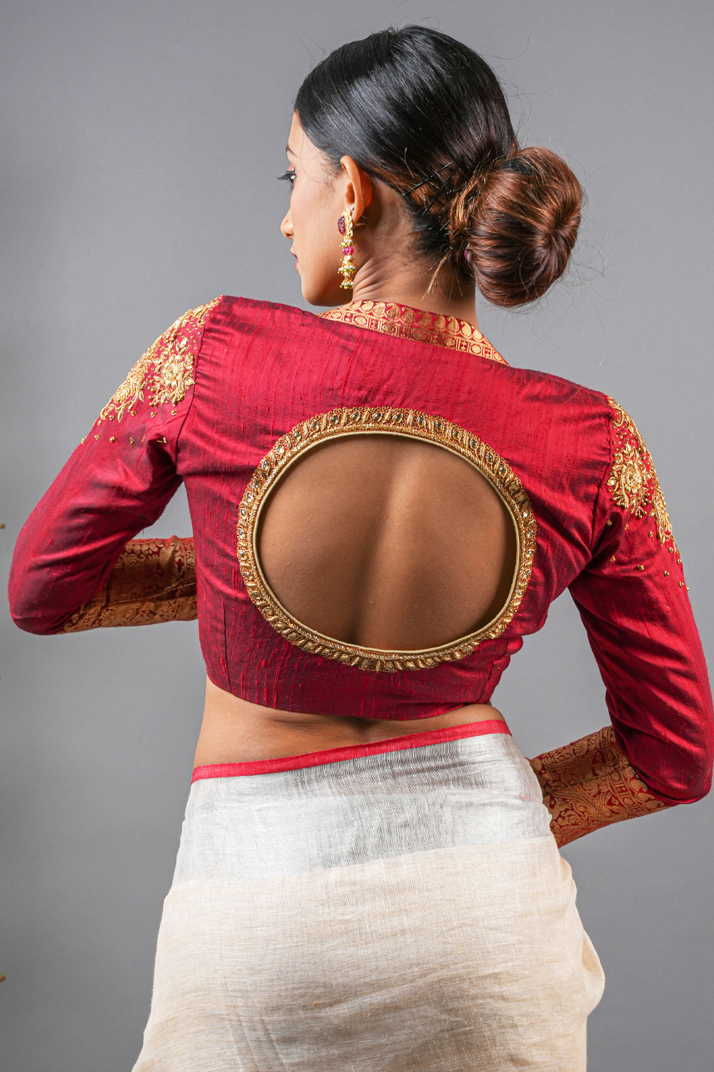 Maroon pure raw silk  zardozi work blouse with full sleeves.
