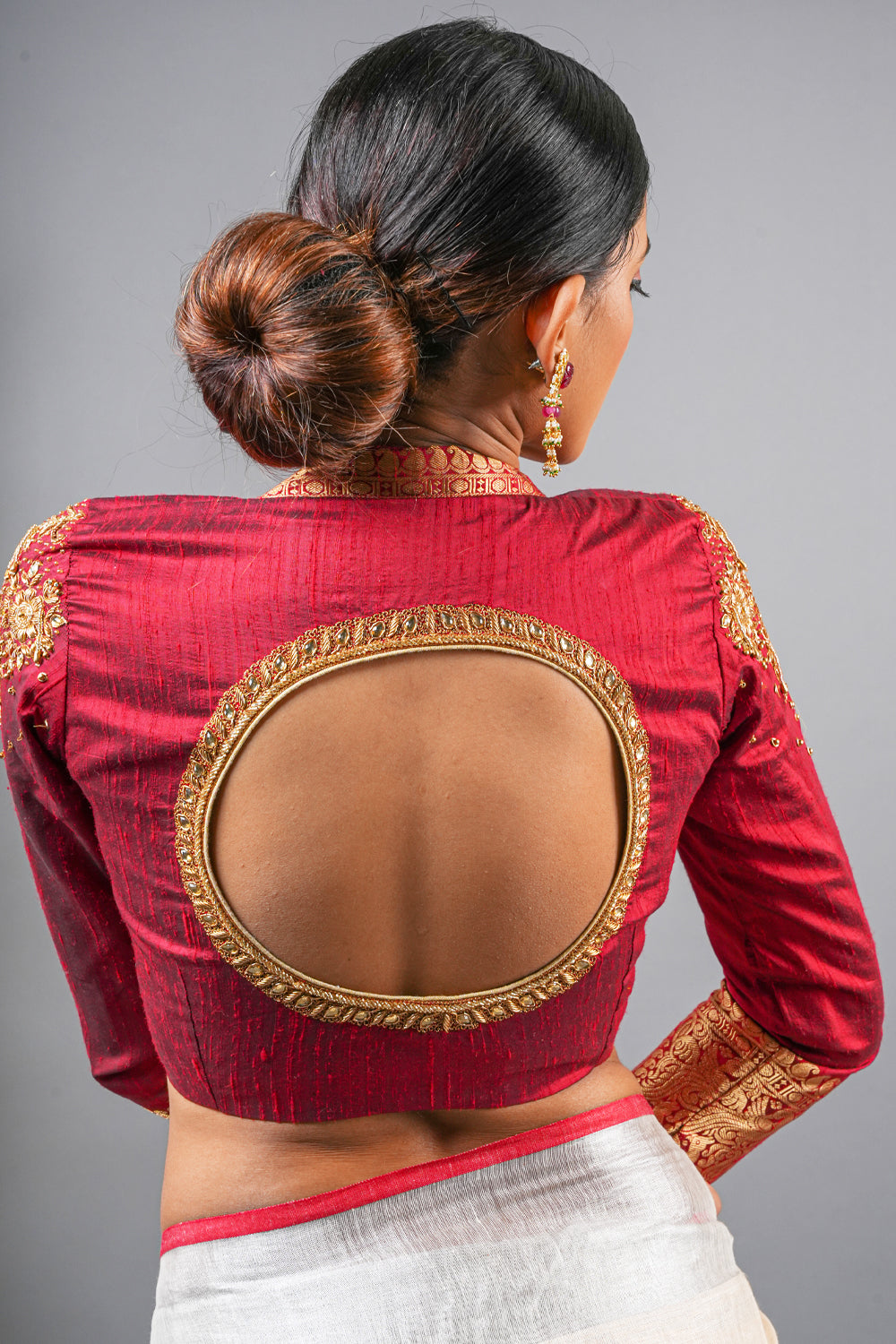 Maroon pure raw silk  zardozi work blouse with full sleeves.