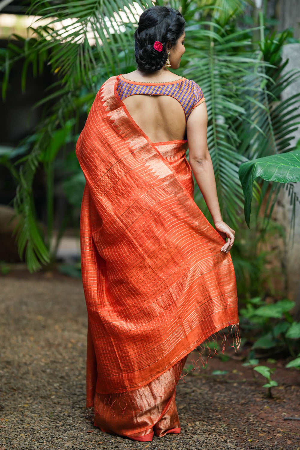 Orange matka silk with zari checks and wide zari temple border Saree