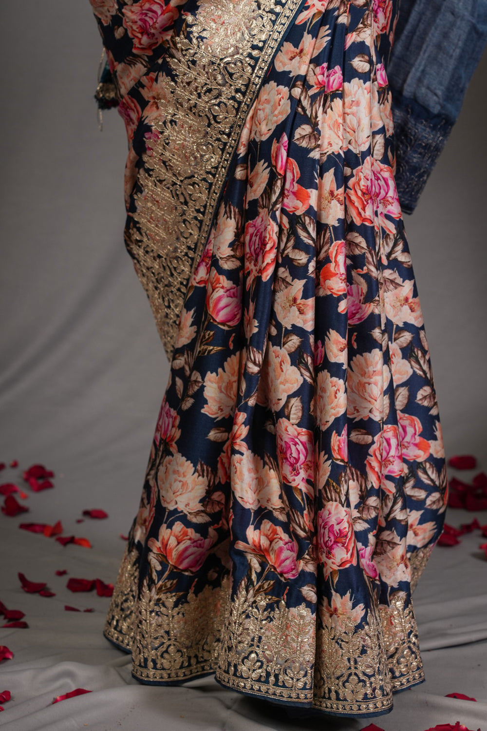 Navy blue gajji silk saree with floral print and crushed zari border