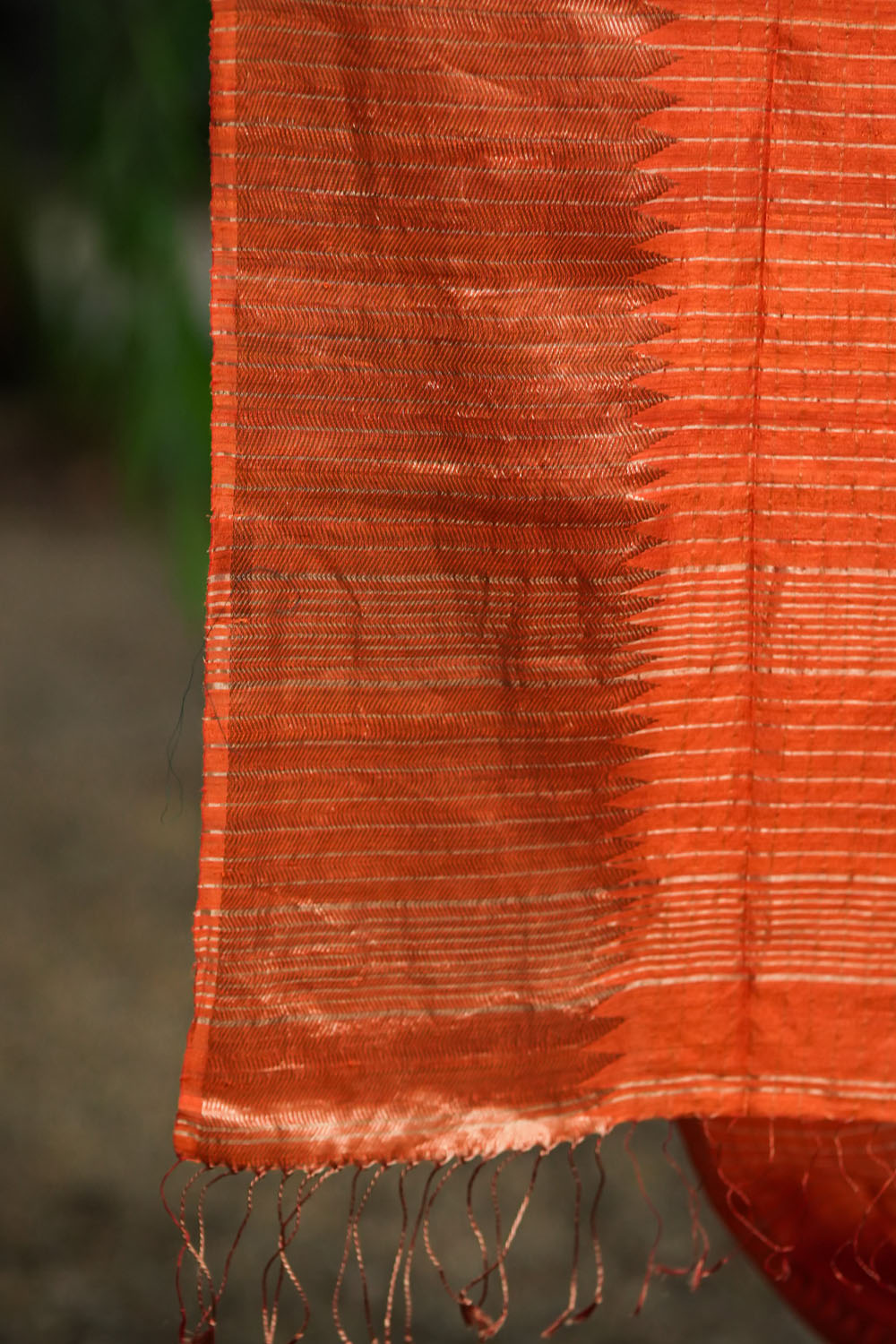 Orange matka silk with zari checks and wide zari temple border Saree