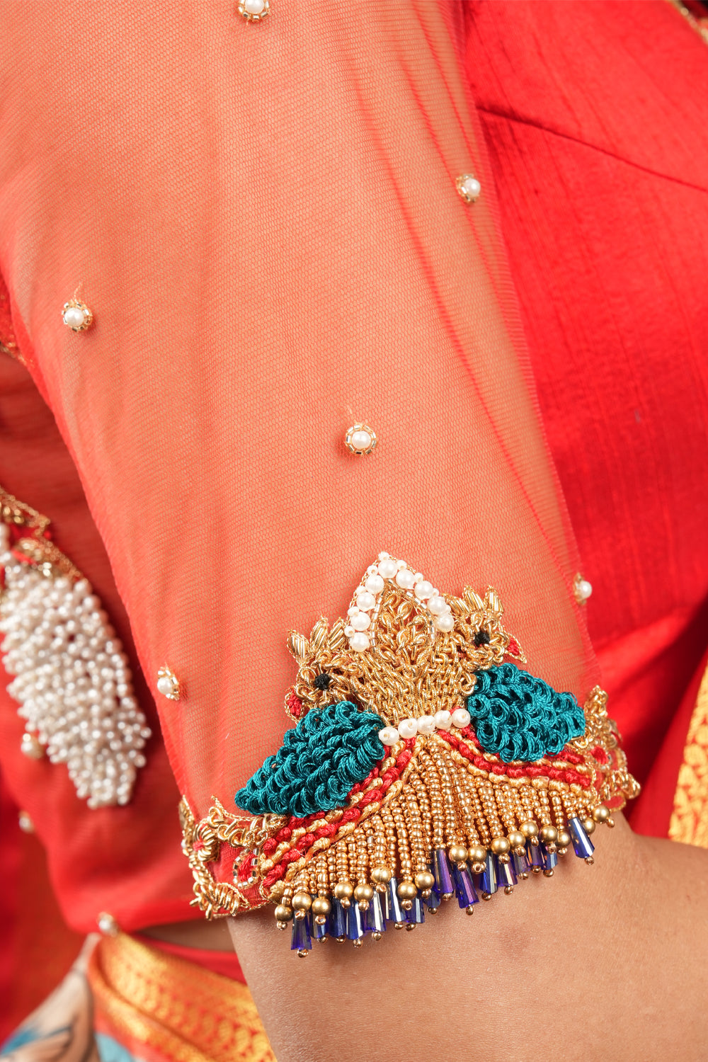 Red Pure raw silk and net peacock design handwork blouse with sheer back sleeves