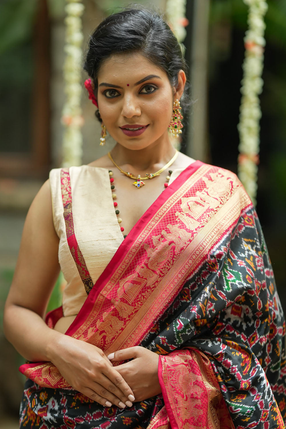 Ivory pure raw silk V neck sleeveless blouse with banarasi trim and potli button detailing