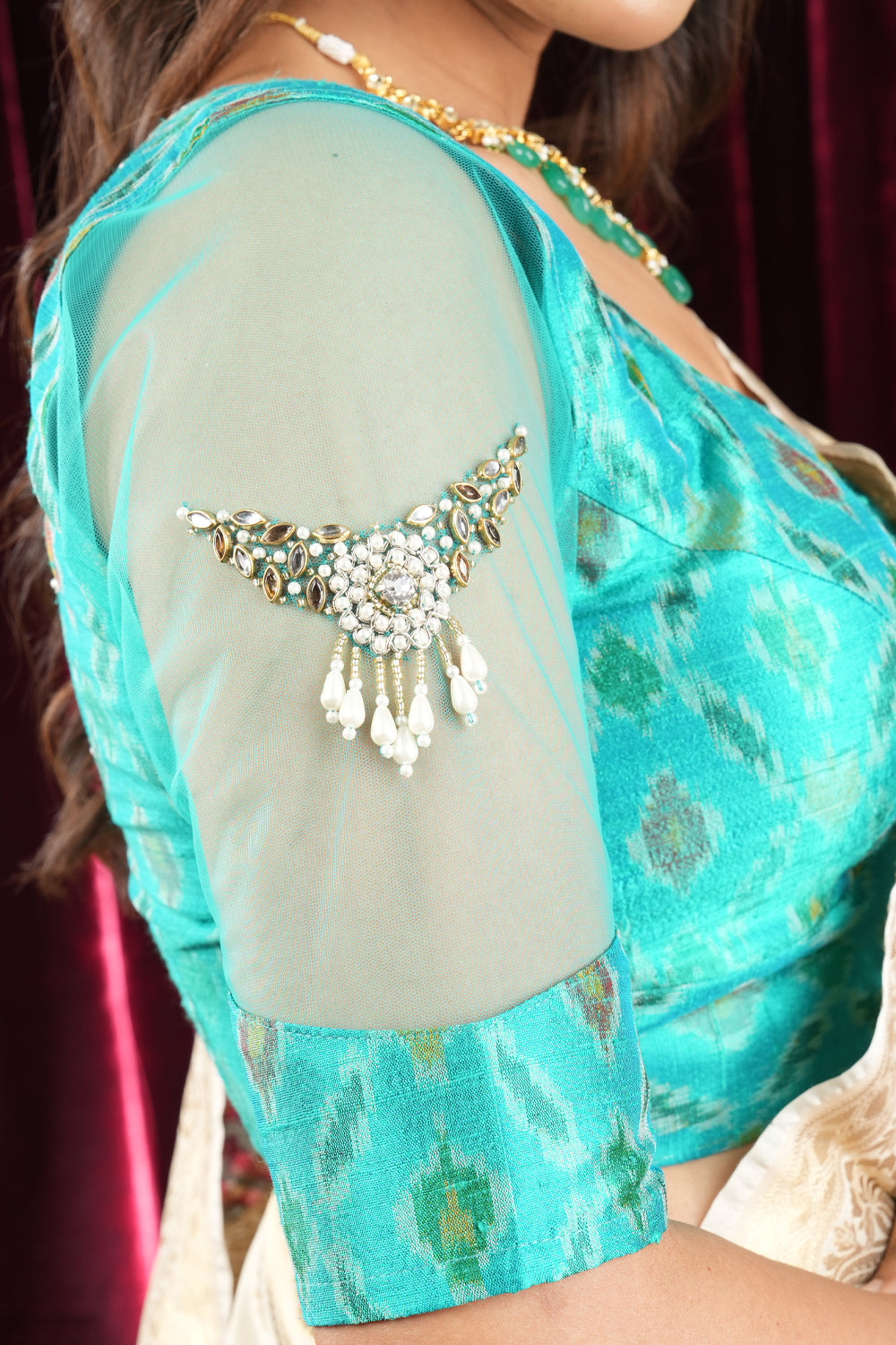 cyan pure ikkat rawsilk blouse with rhinestone detailing in back and sleeves