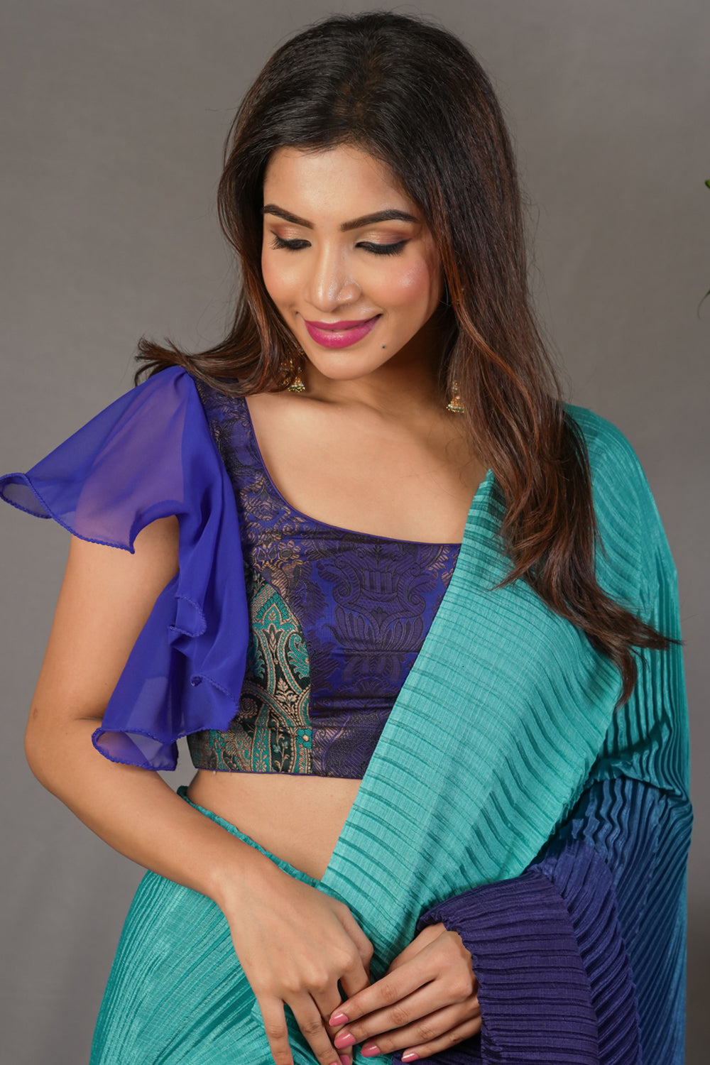 Turquoise blue banarasi brocade flutter sleeve U neck blouse