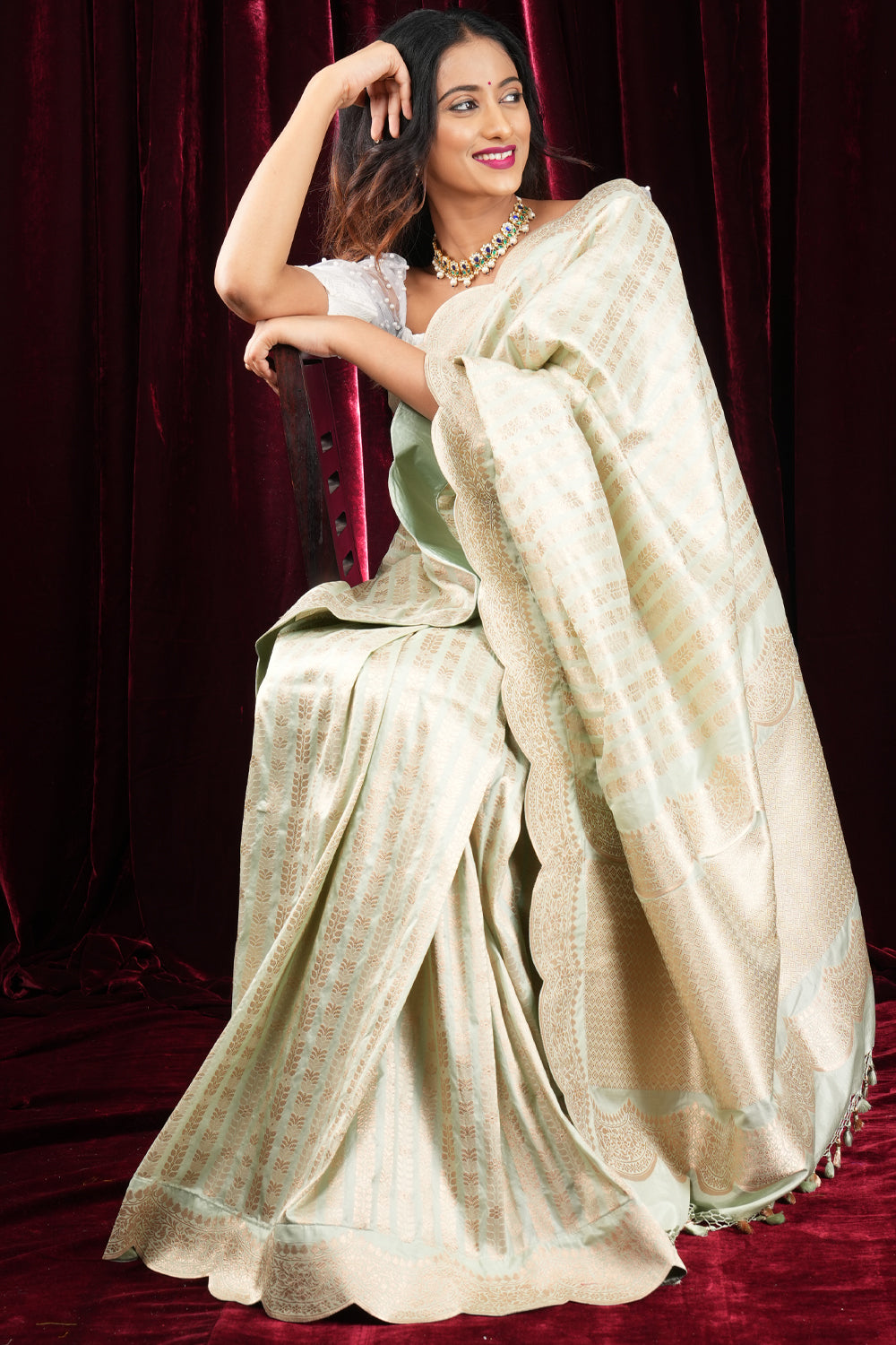 Exquisite Pale Green Scallop Border Banarasi Katan Silk Saree with Vertical Zari Stripes | SILK MARK CERTIFIED
