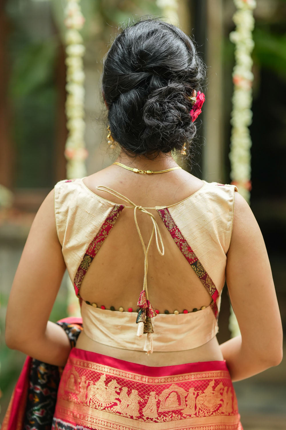 Ivory pure raw silk V neck sleeveless blouse with banarasi trim and potli button detailing