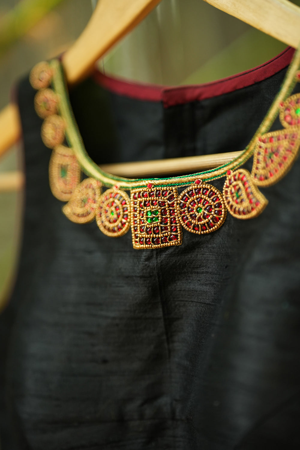 Black pure raw silk U neck blouse with beadwork