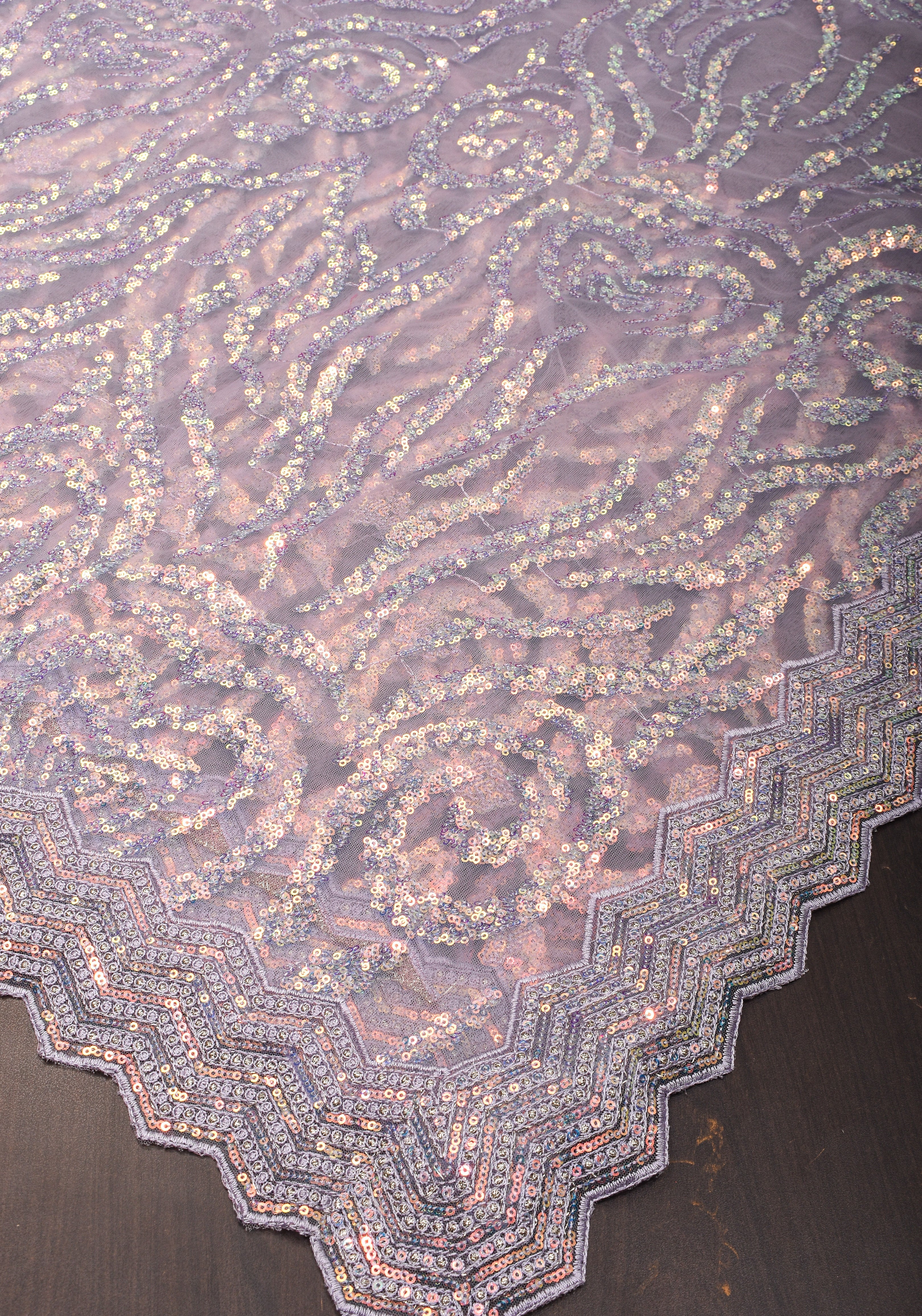 Swirls Design Dusty Pastel lavender Net Saree with sequins