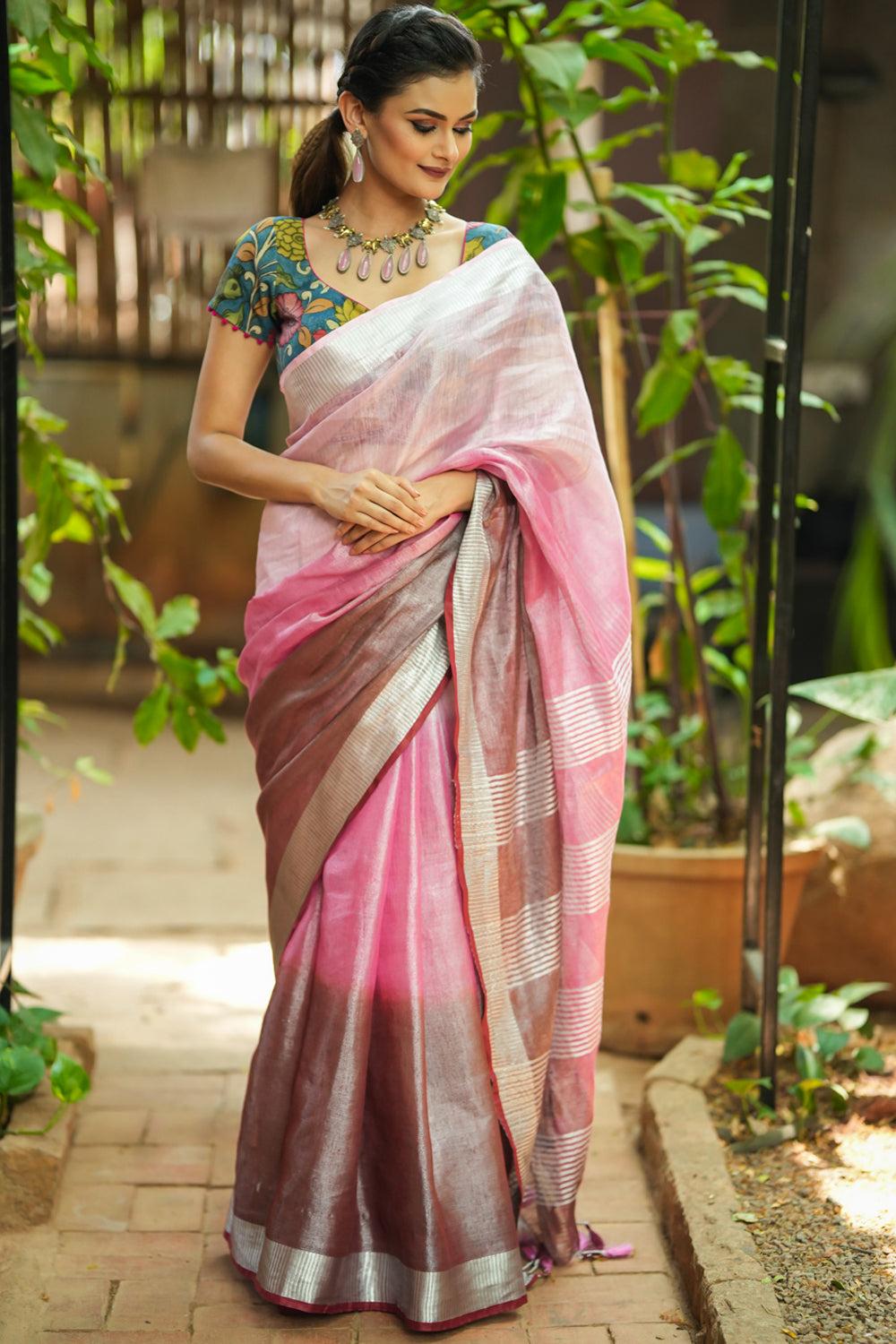 Blush pink and burgundy ombre linen saree with silver  border.