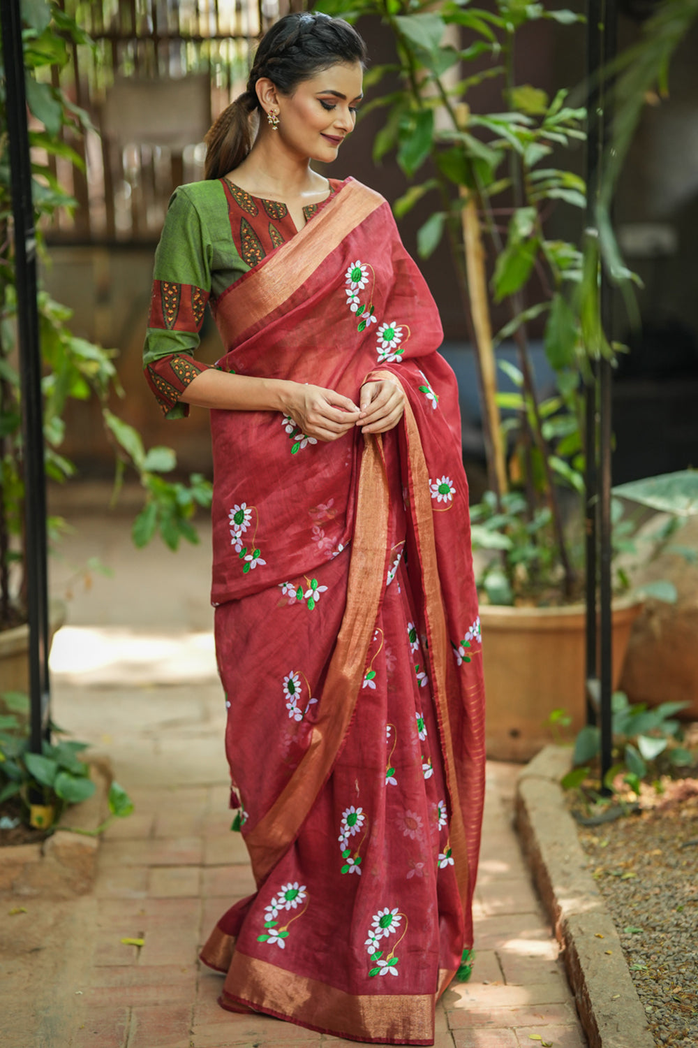 Brick red embroidered linen saree