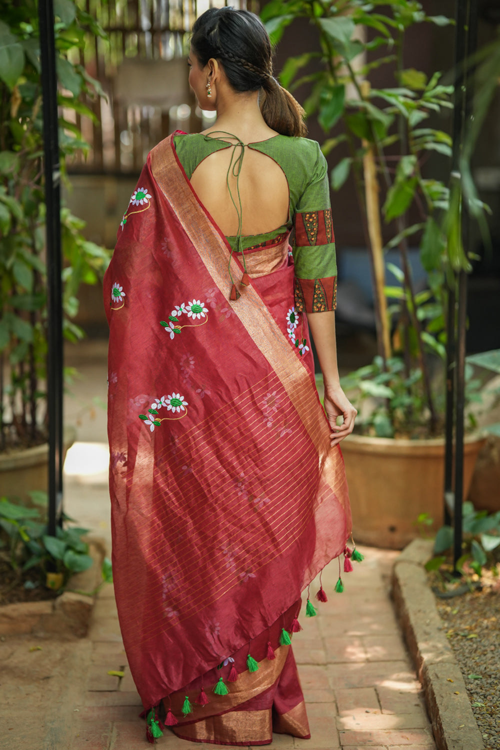Brick red embroidered linen saree