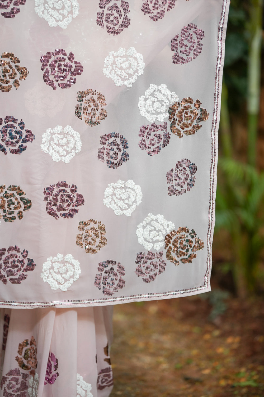 Silver and pink sequin worked georgette saree in dusty peach