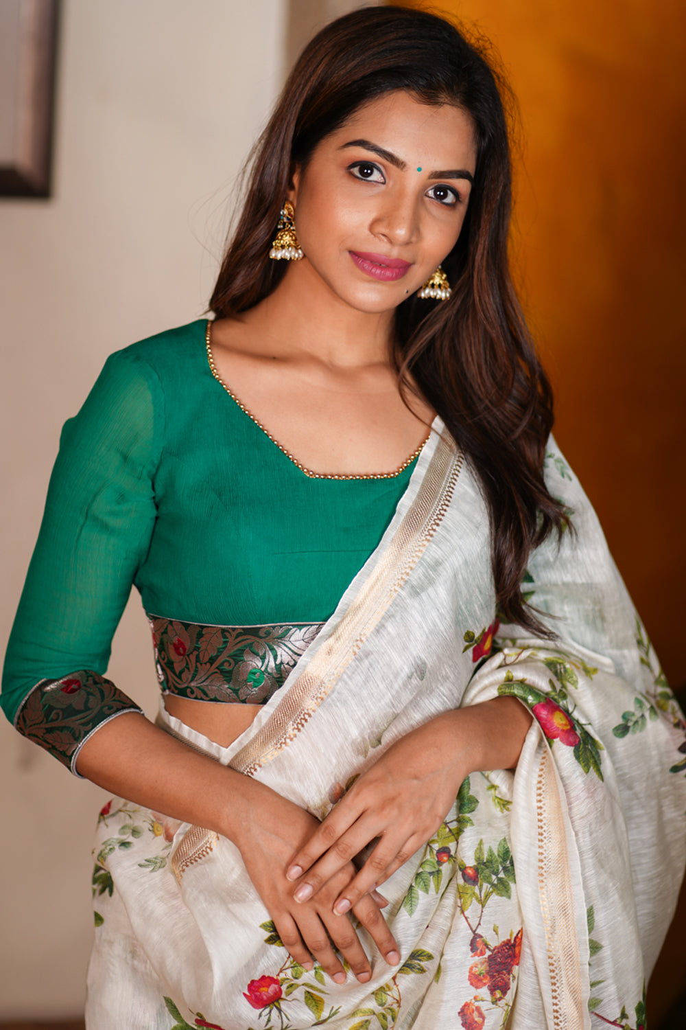 Green chiffon blouse with brocade detailing and sheer sleeves