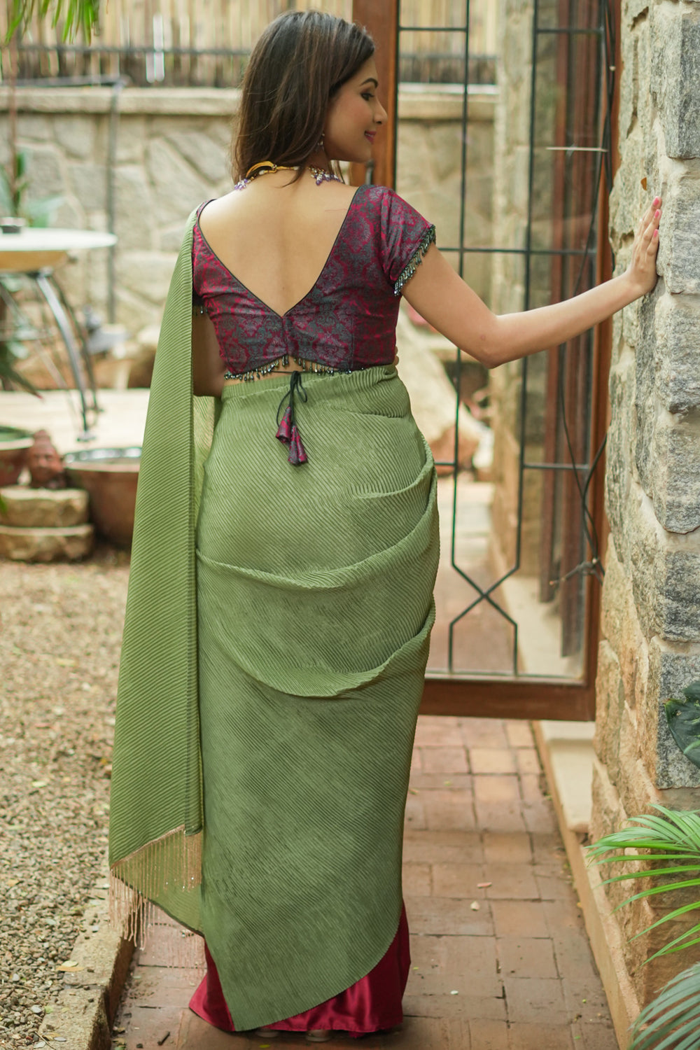Sage green and maroon pleated satin saree