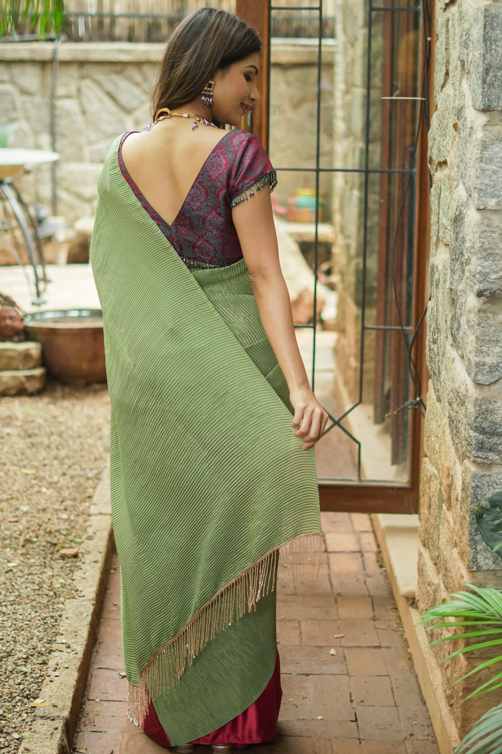 Sage green and maroon pleated satin saree