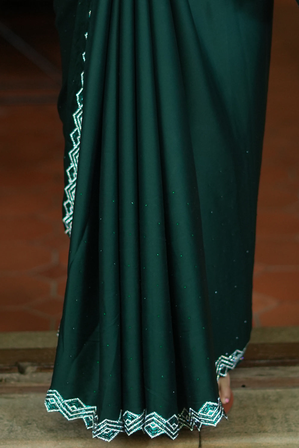Bottle green soft satin saree with stone work border