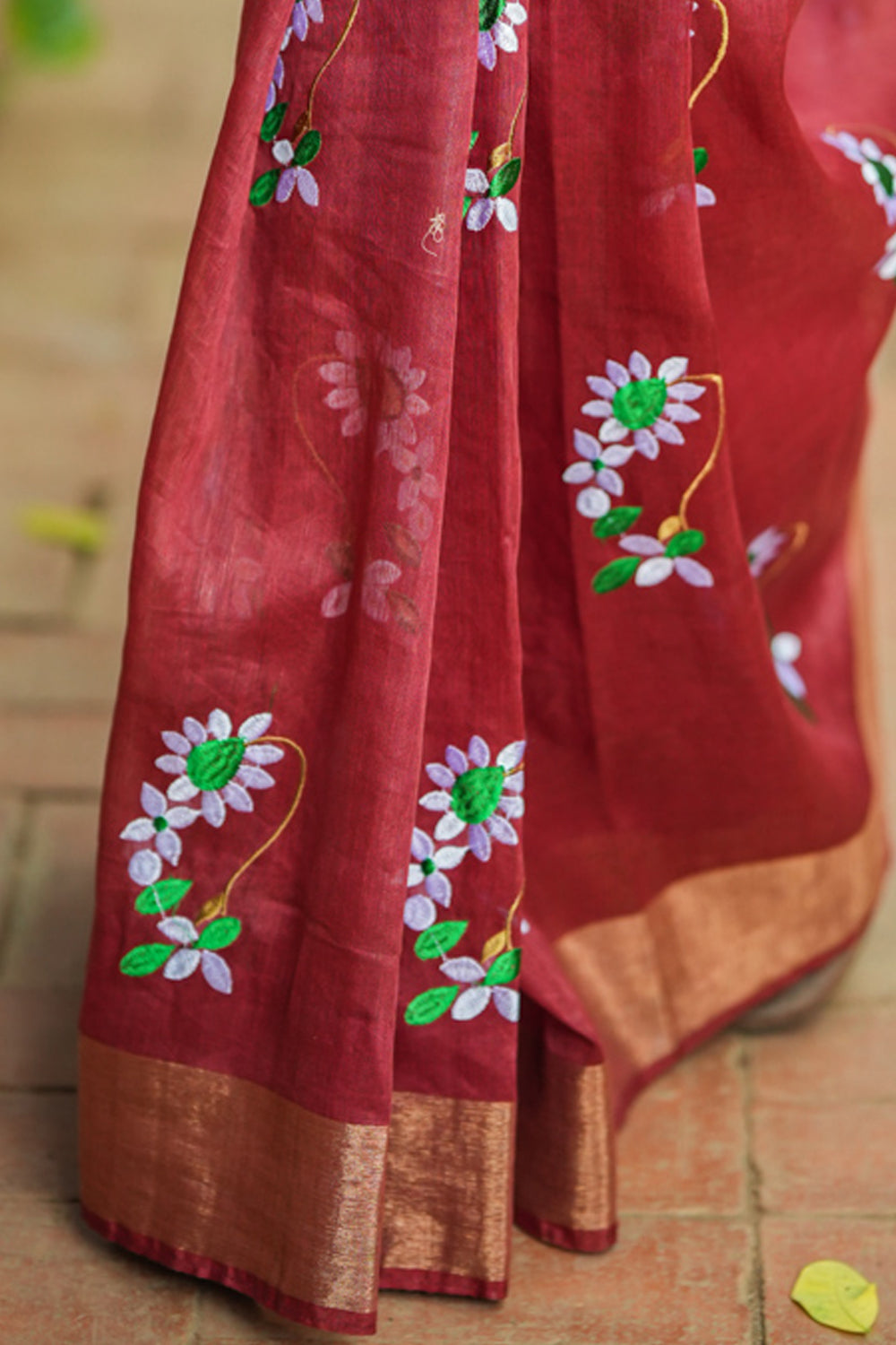 Brick red embroidered linen saree