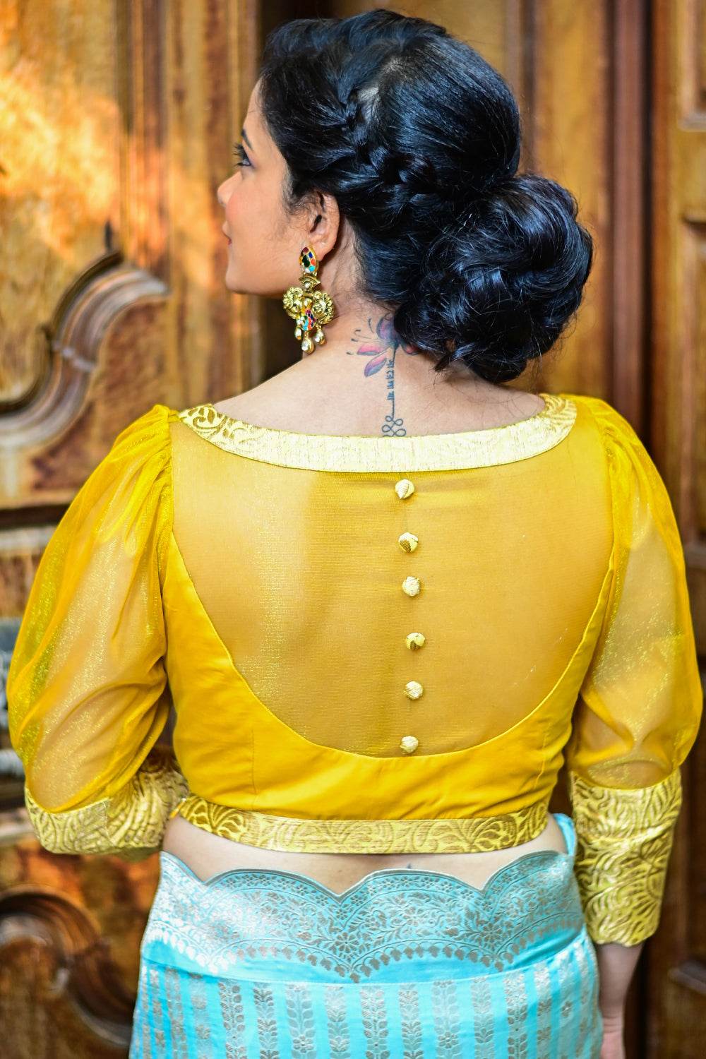 Yellowish mustard silk boat neck blouse with sheer yoke