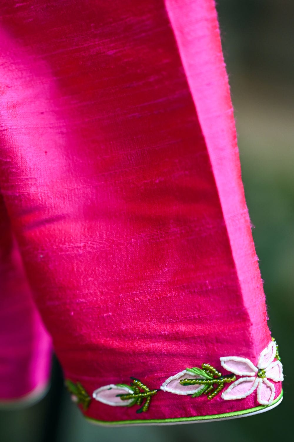 Hot pink raw silk close neck blouse with handpainted and embroidered malli poovu