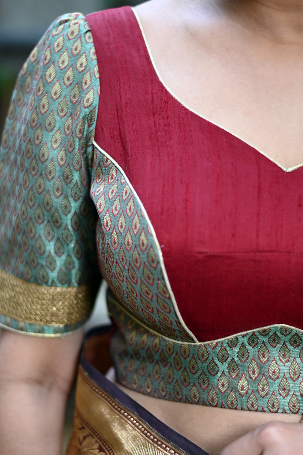 Pistachio green brocade and maroon raw silk sweetheart neck blouse