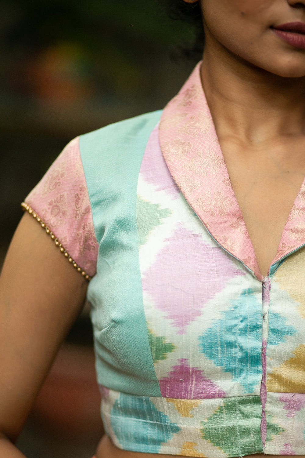 White and multicolour Ikat raw silk mixed fabric V neck collared blouse with gold bead edging - House of Blouse