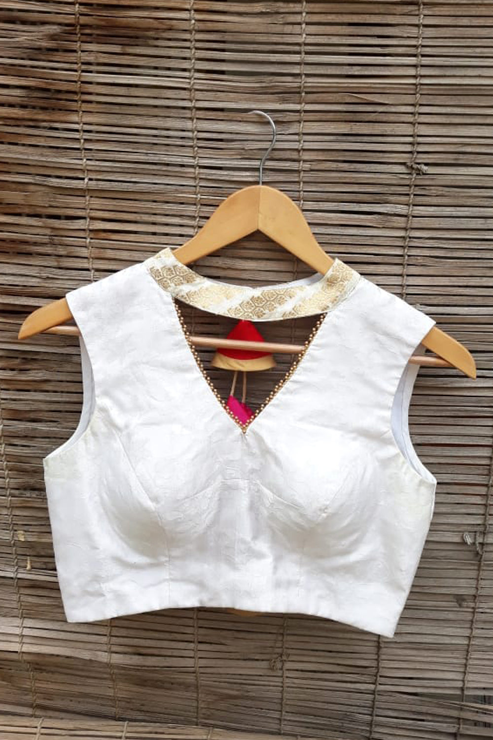 White embossed satin brocade blouse with brocade collar and gold bead edging - House of Blouse