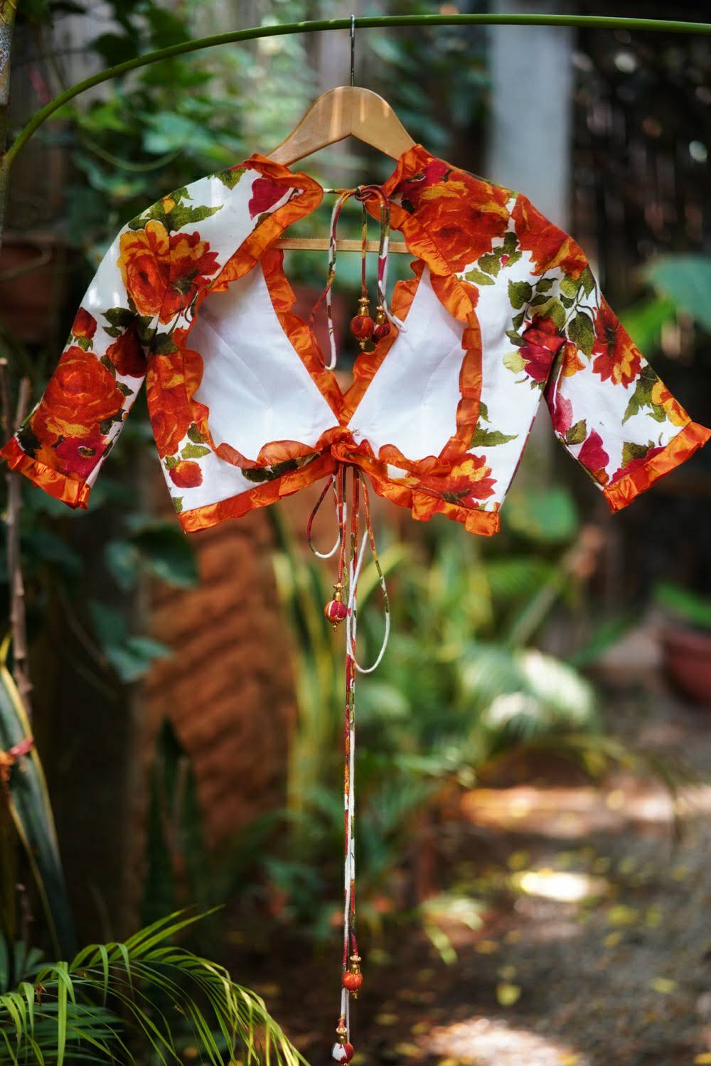 Off white and orange floral handspun & pure muslin v neck blouse with frill detailing - House of Blouse