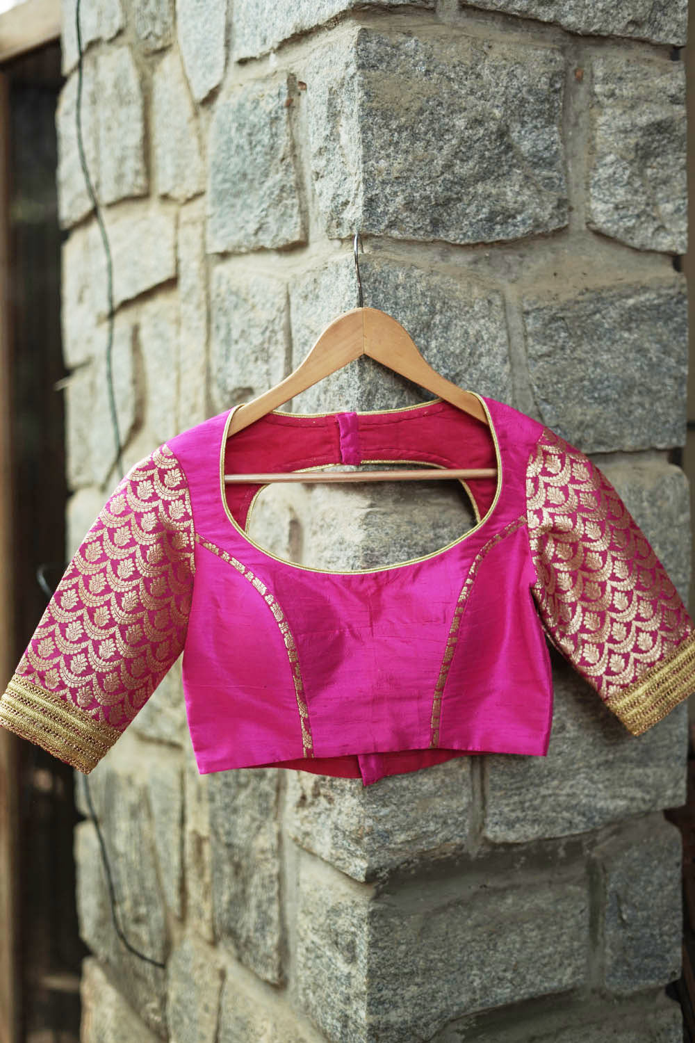 Fuchsia pink raw silk U neck blouse with banarasi brocade sleeves