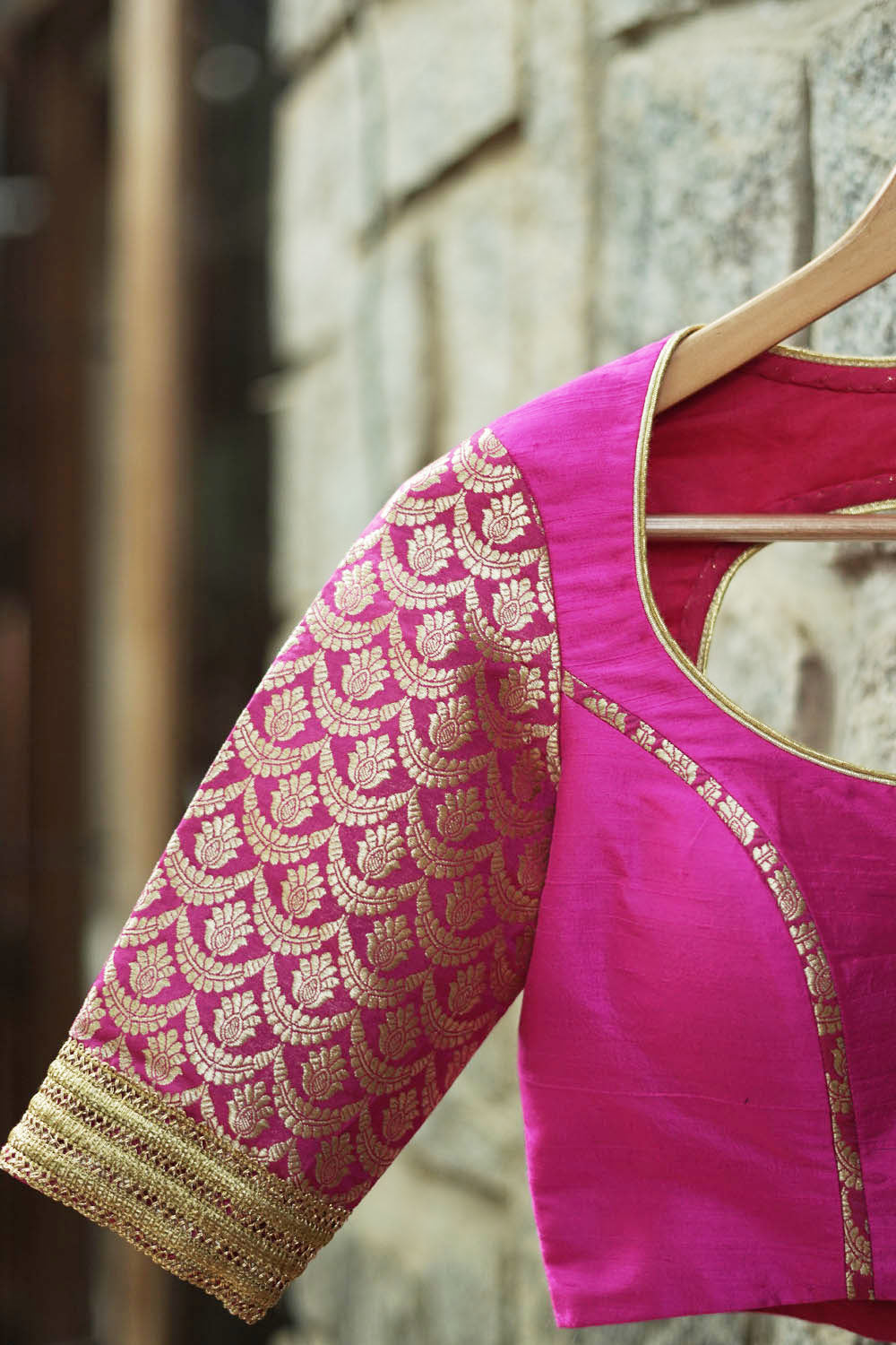 Fuchsia pink raw silk U neck blouse with banarasi brocade sleeves