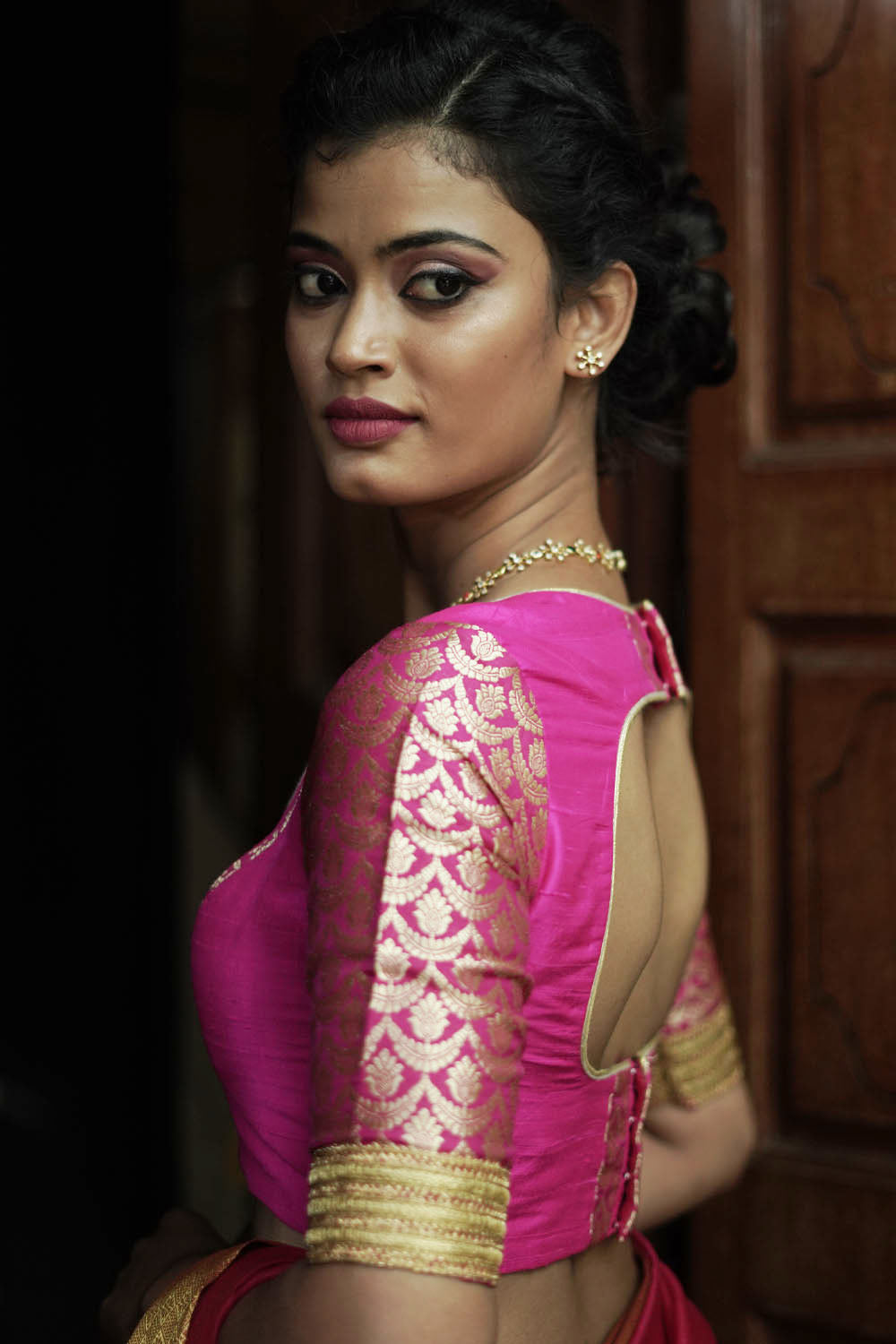Fuchsia pink raw silk U neck blouse with banarasi brocade sleeves