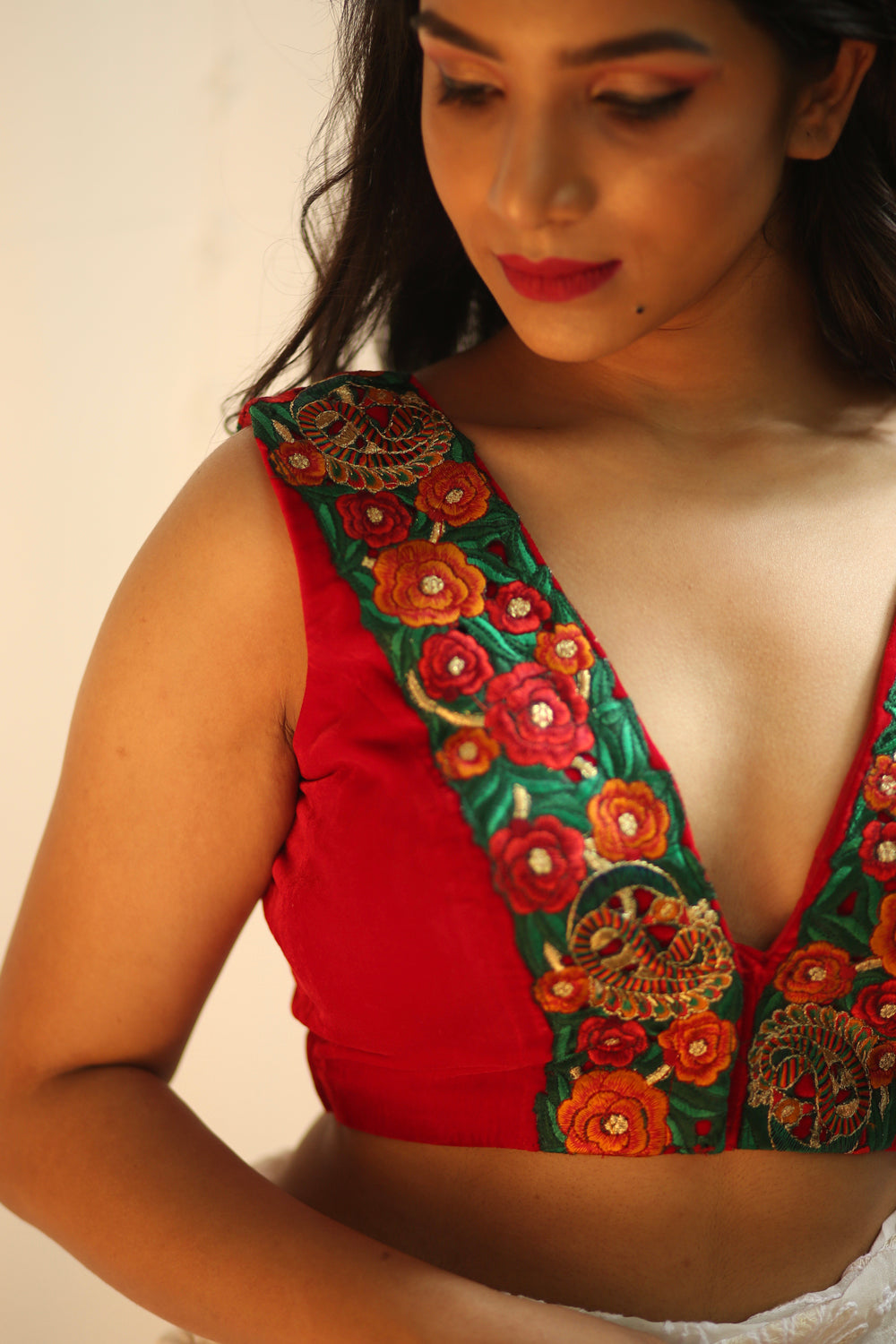 Red velvet V neck blouse with multi colour floral border