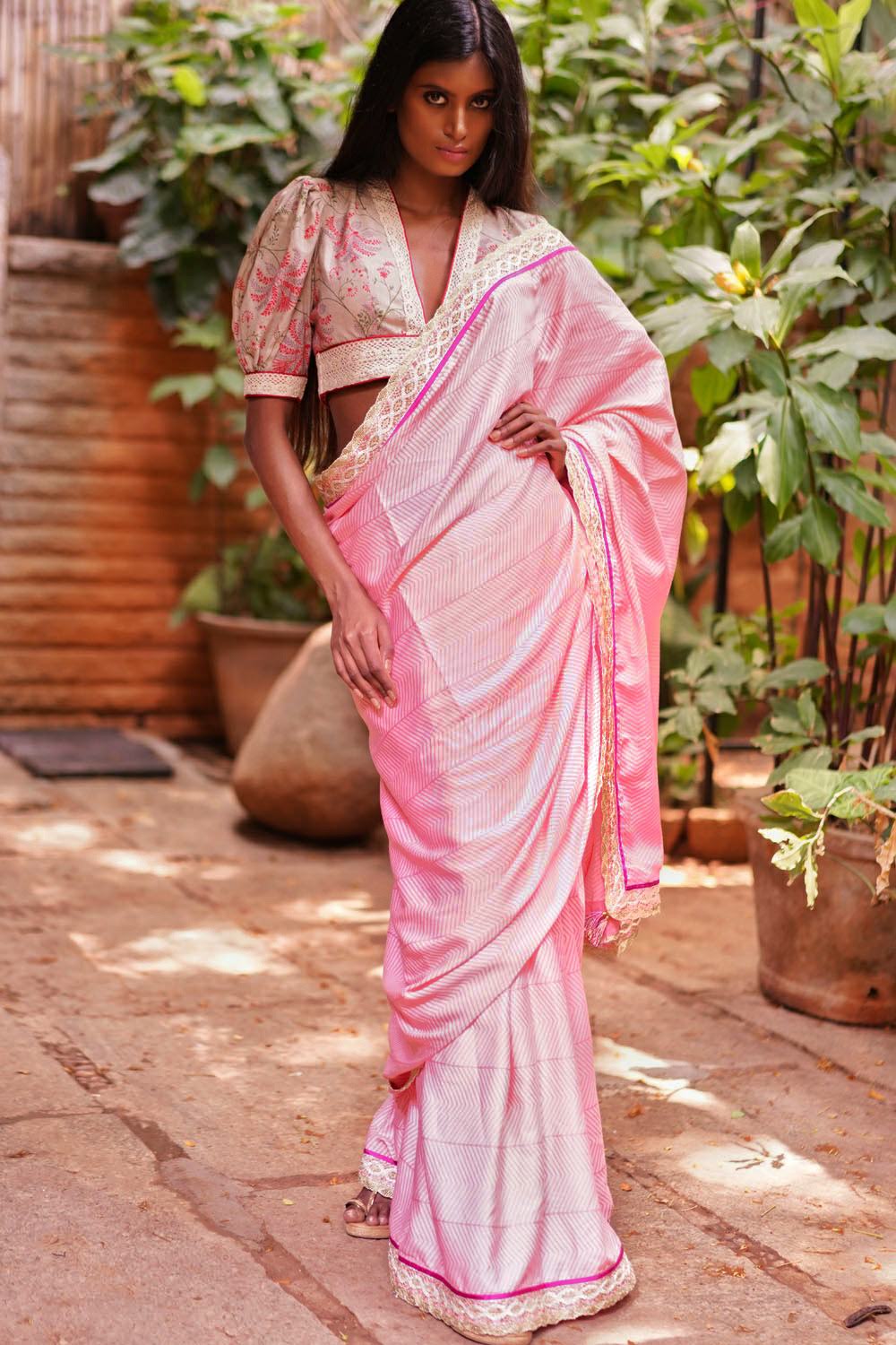 Peach stripe cotton saree with Dull gold filigree and dark pink border