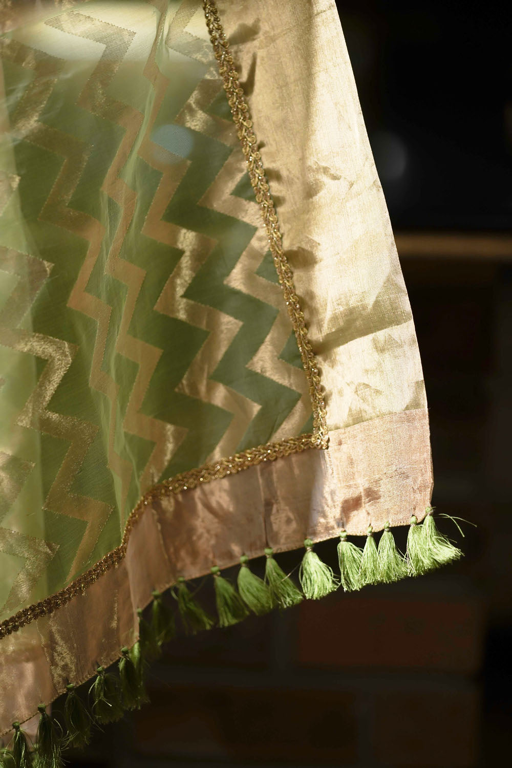 Pale green chanderi saree with gold zari buttis and gold tissue with lace border