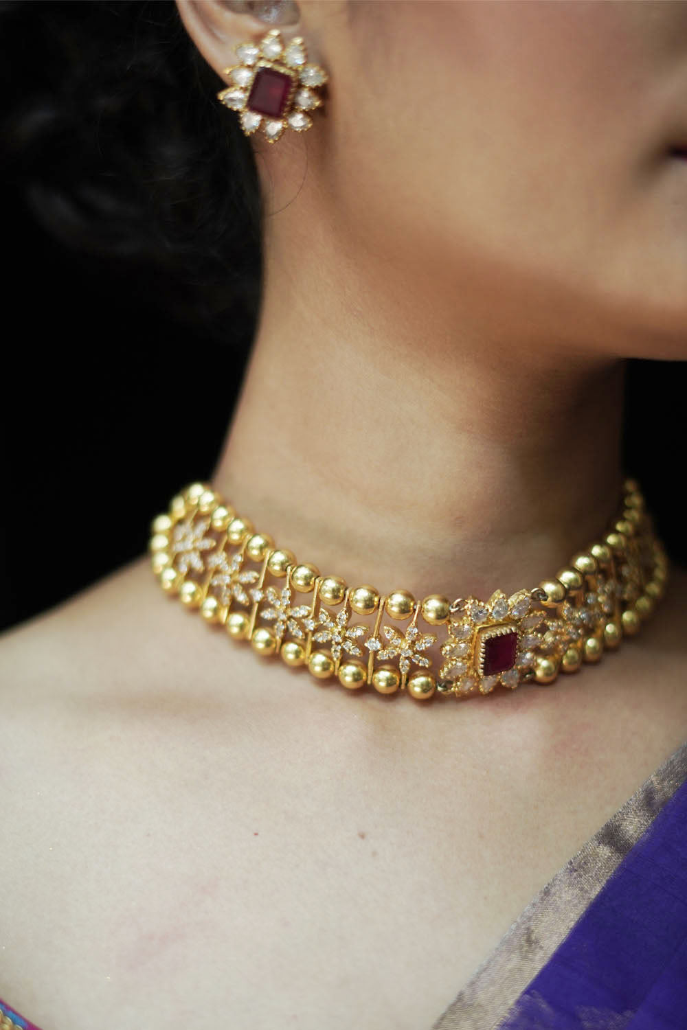 Zircon stones gold plated necklace with matching studs