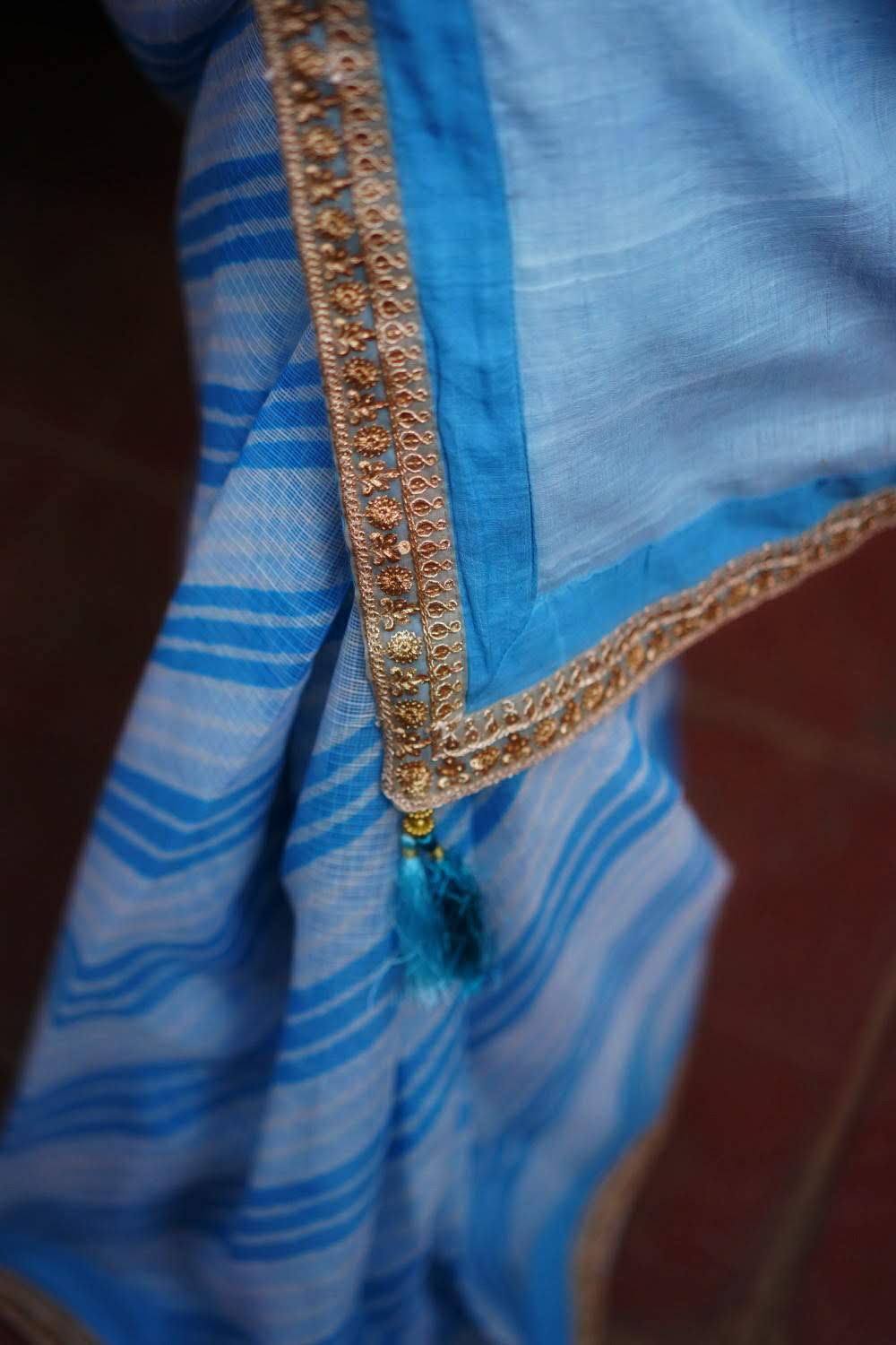 Sky blue and white handloom & hand dyed leheriya saree with gold sequin border - House of Blouse