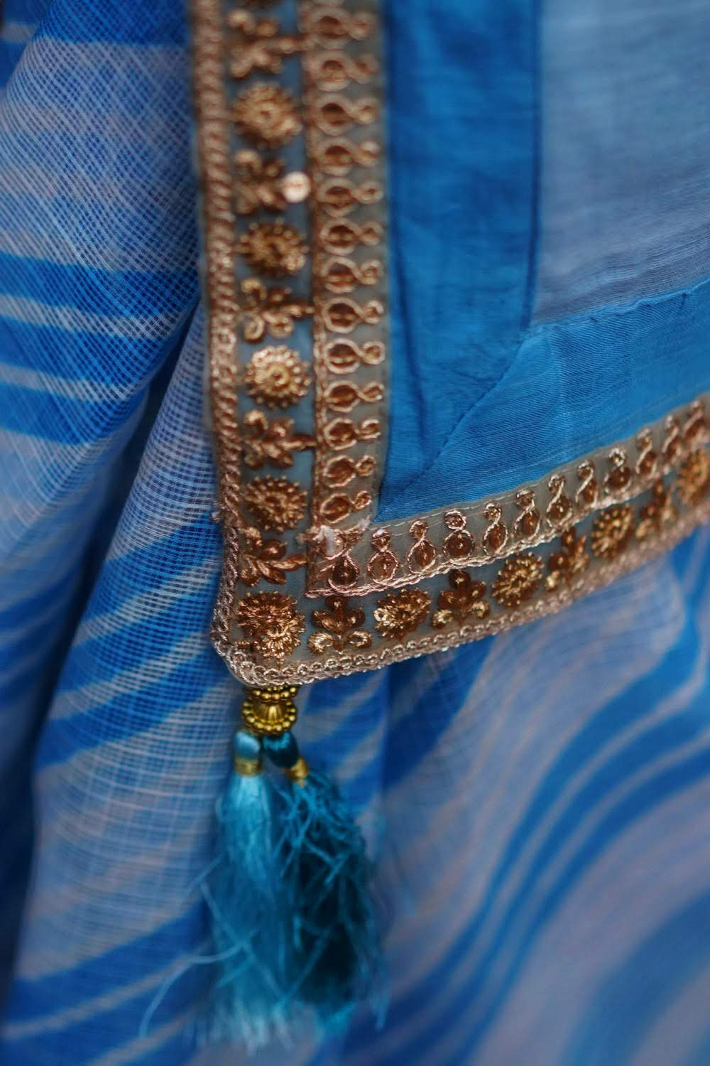 Sky blue and white handloom & hand dyed leheriya saree with gold sequin border - House of Blouse