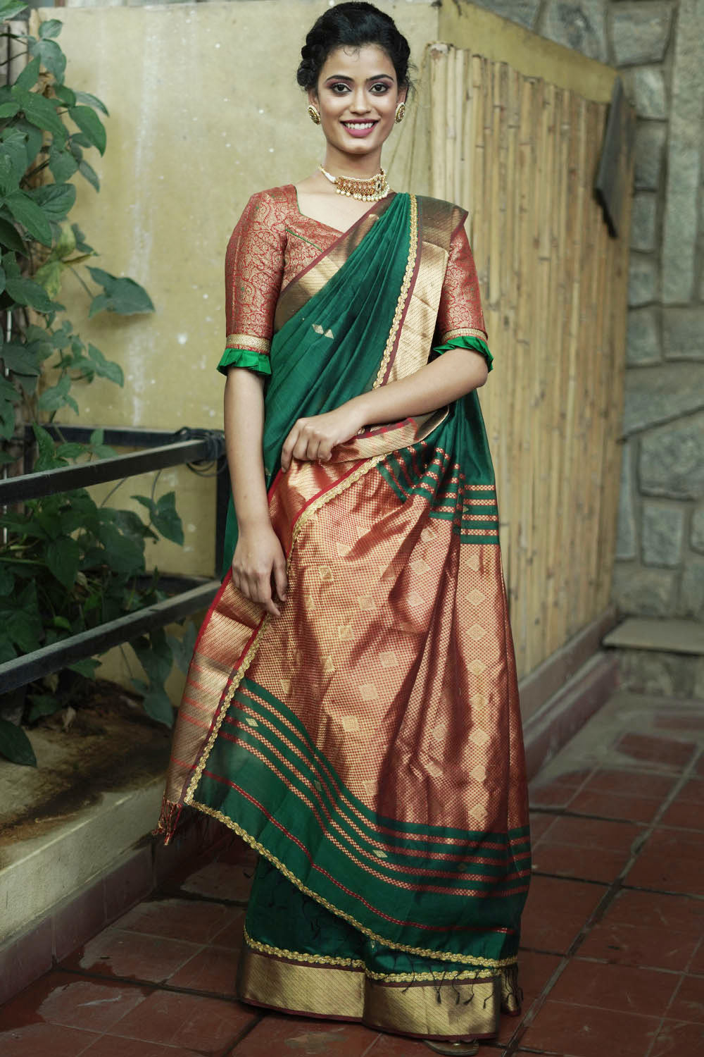 Pine green maheshwari silk saree with lace and gold border
