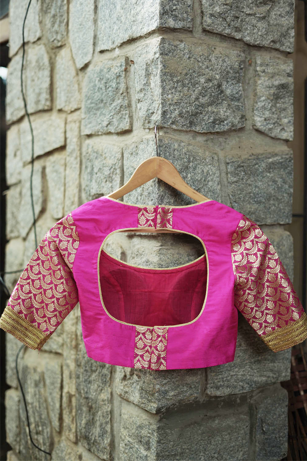 Fuchsia pink raw silk U neck blouse with banarasi brocade sleeves