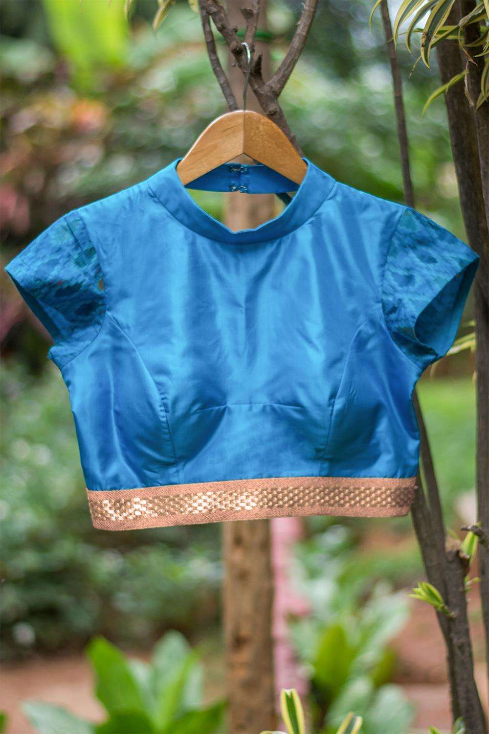 Blue silk high neck blouse with back detailing - House of Blouse