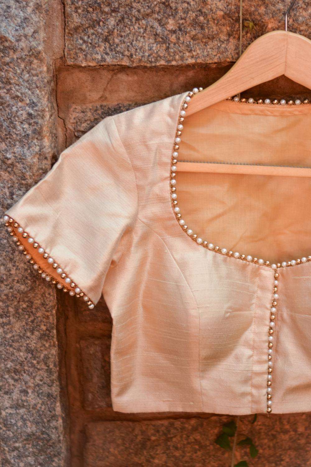 Cream raw silk pot neck blouse with bead detailing - House of Blouse