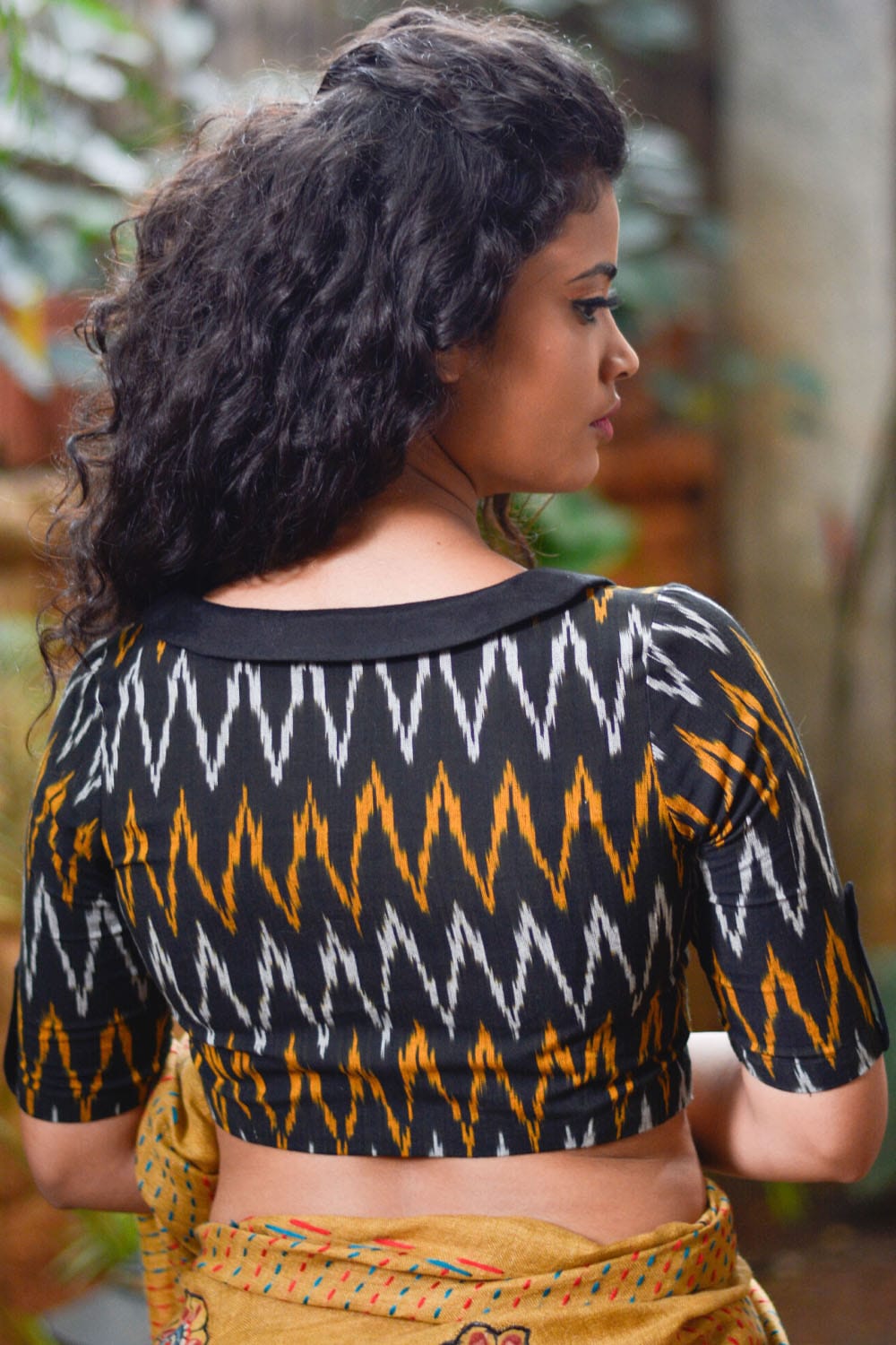 Black and mustard ikat cotton V neck collared blouse with cuff detailing