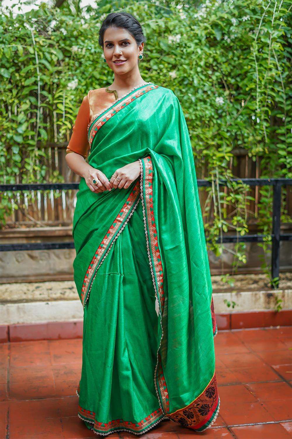 Fern green semi matka silk saree with orange-green geometric border - House of Blouse
